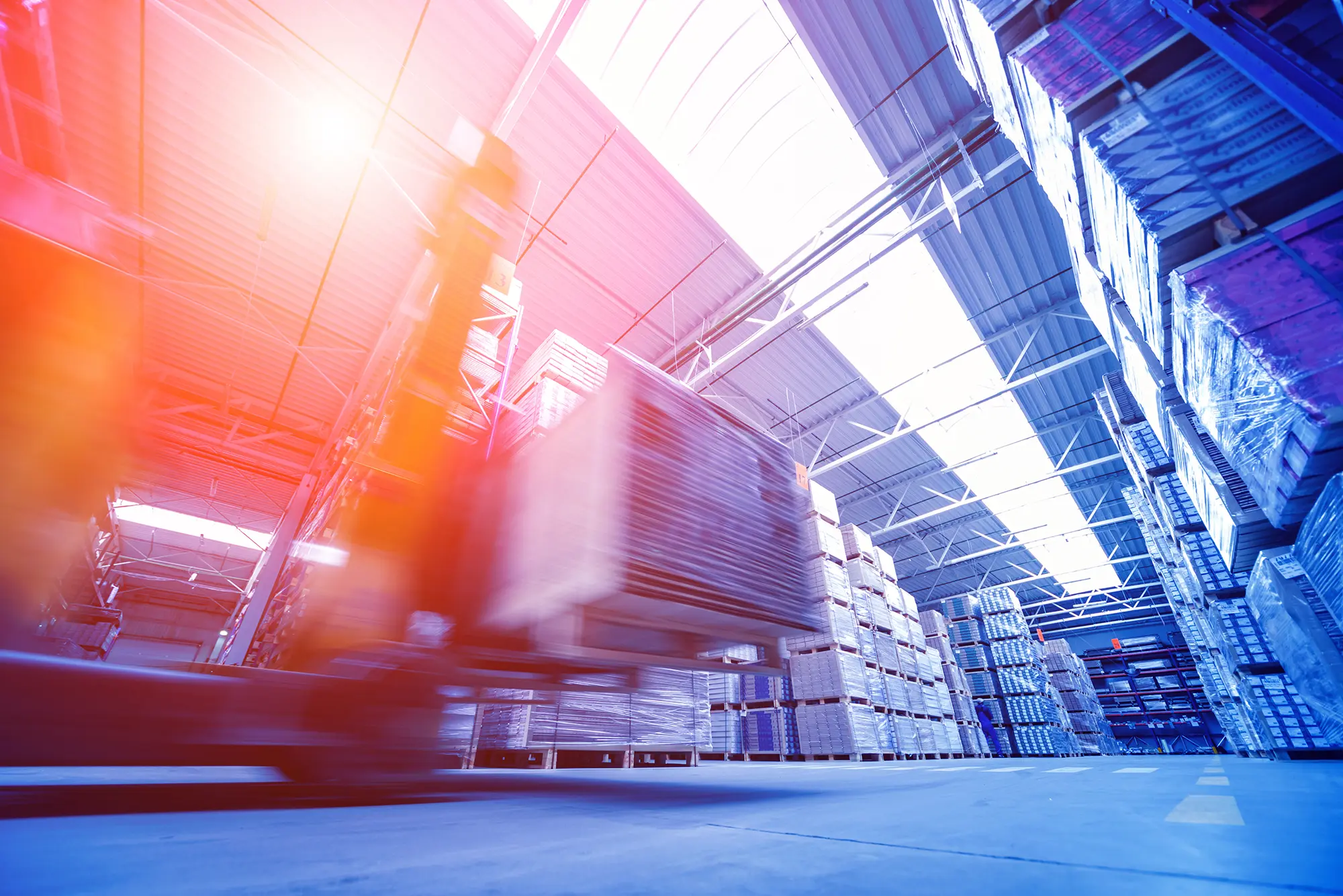 Forklift loader operating in a port-adjacent cold storage ship yard